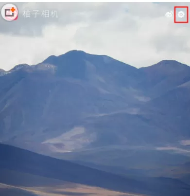 柚子相机中打开自动存储原图的具体操作方法
