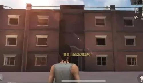 在荒野行动游戏中进行攻楼的具体操作